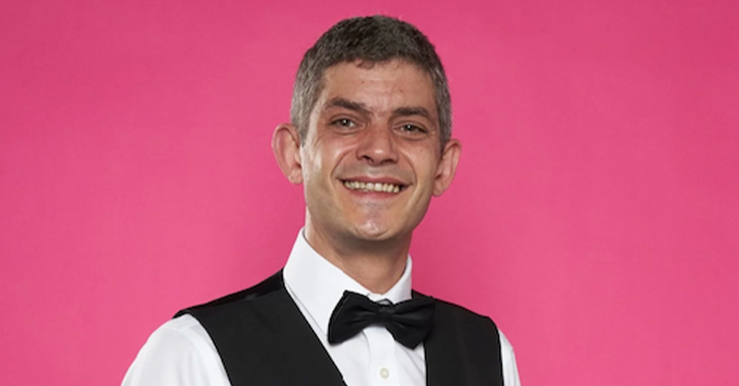 First Dates star merlin smiling in a bow tie