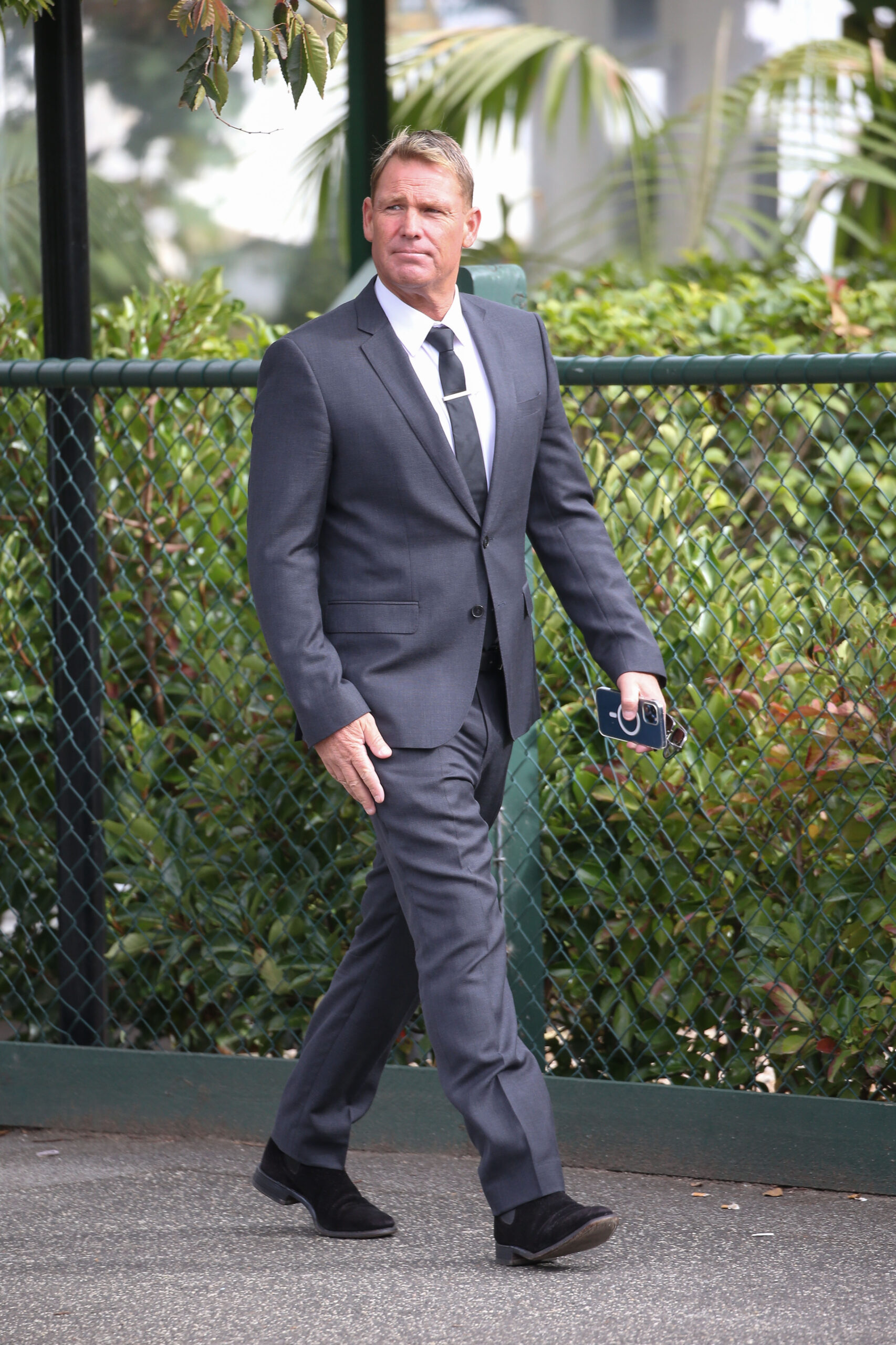 SHANE WARNE looking sombre
