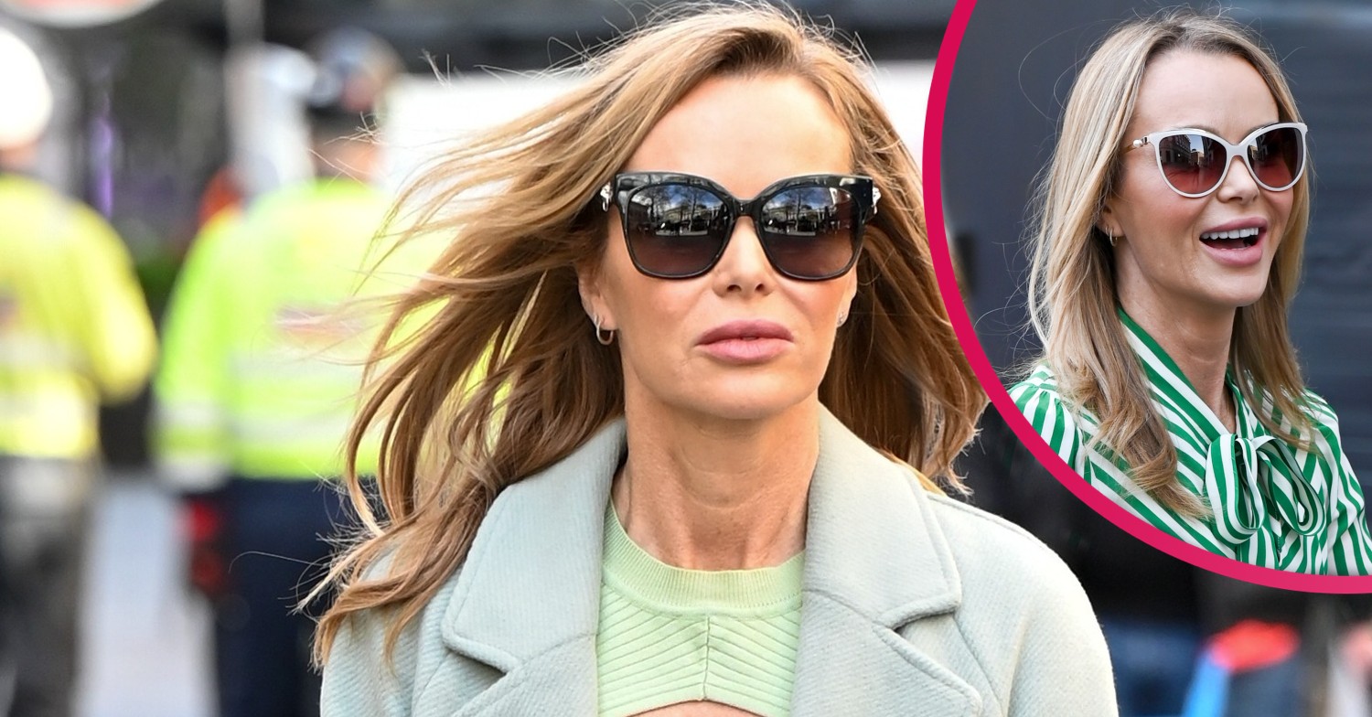 Amanda Holden smiles during outing