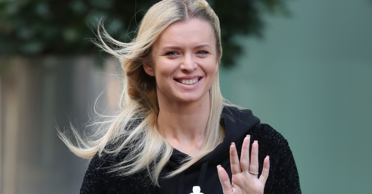 Nadiya Bychkova smiling and waving for the camera