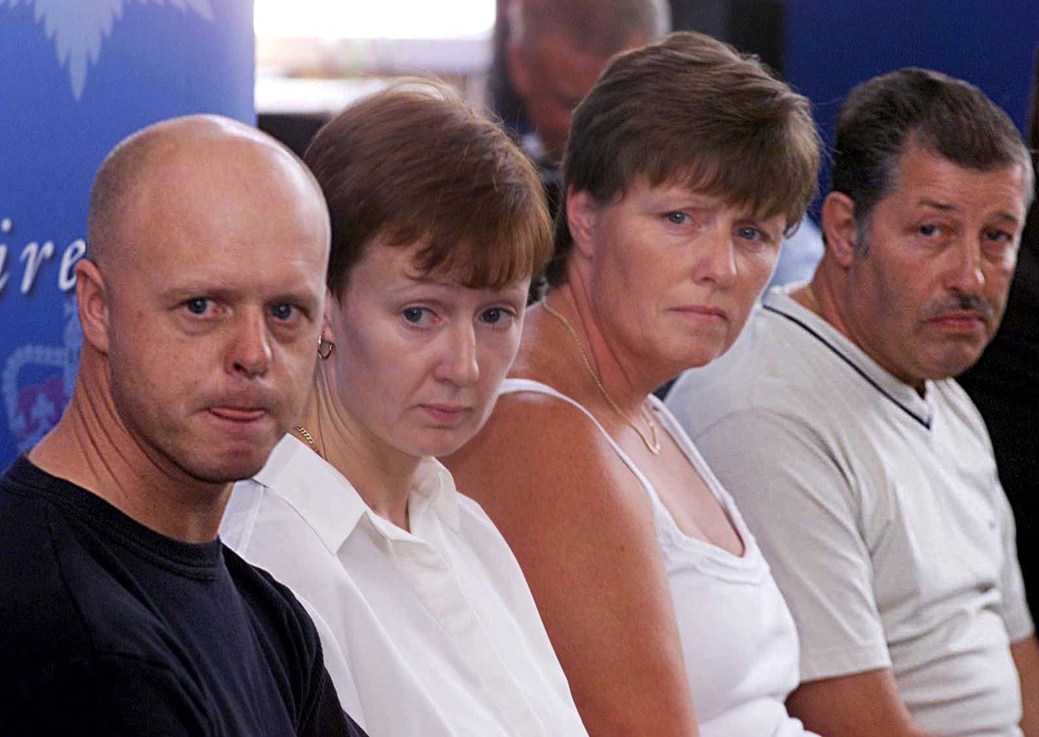 Holly and Jessica's parents while they were missing