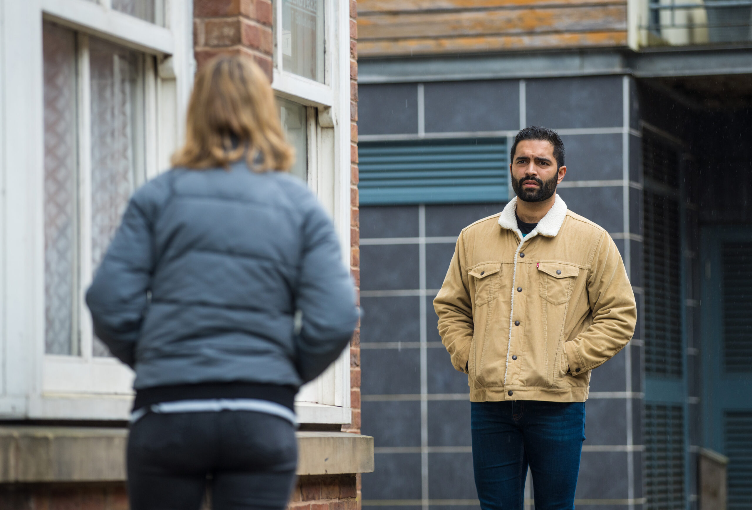 Imran and Abi in the street Coronation Street
