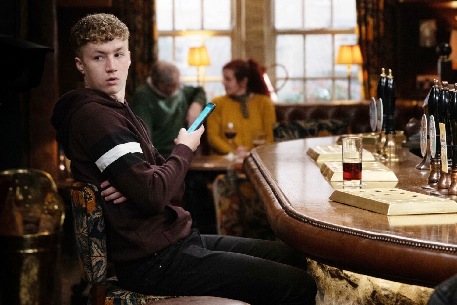 Noah with Chloe's phone in Emmerdale 