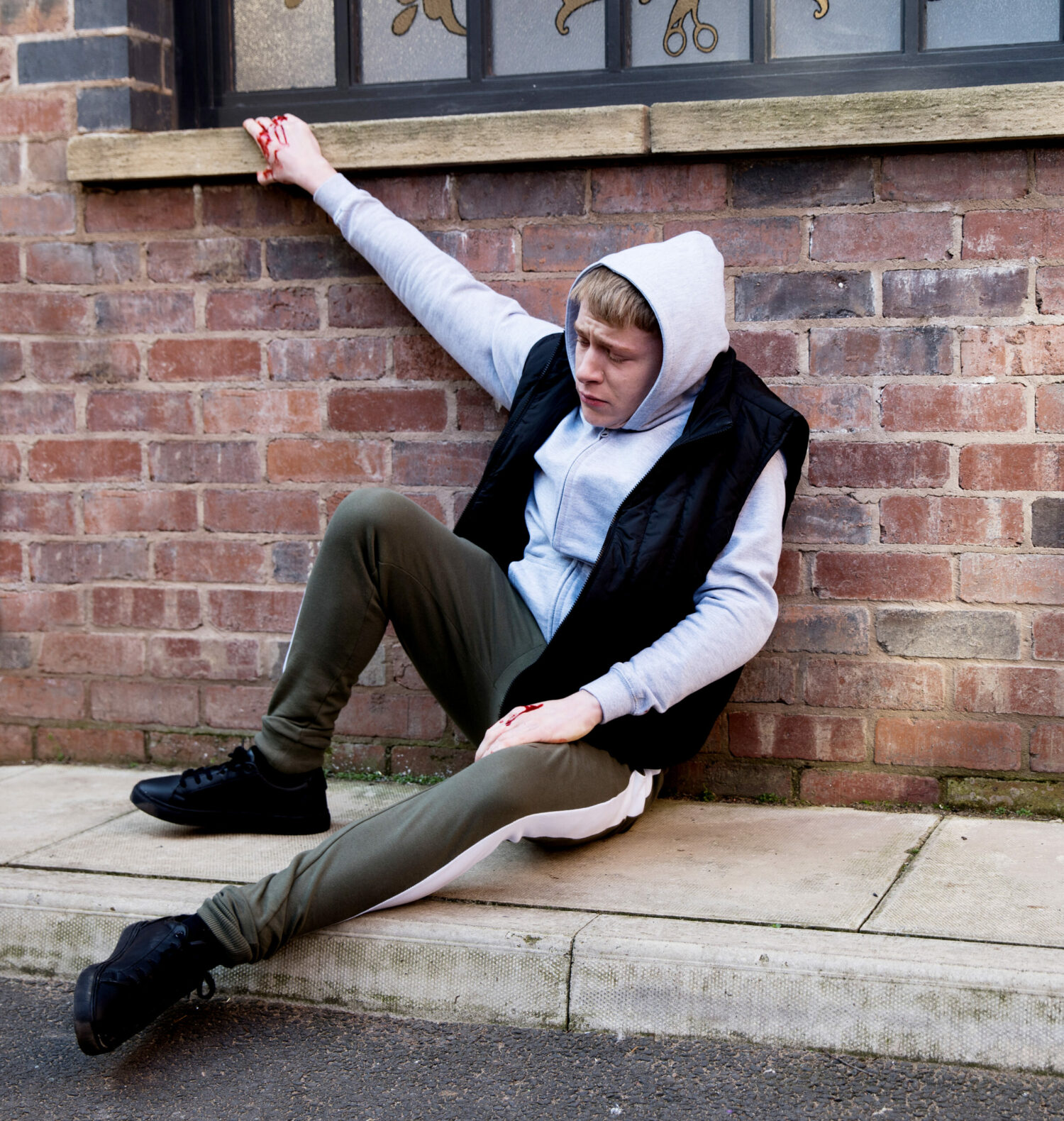 Coronation Street Max bleeding on pavement