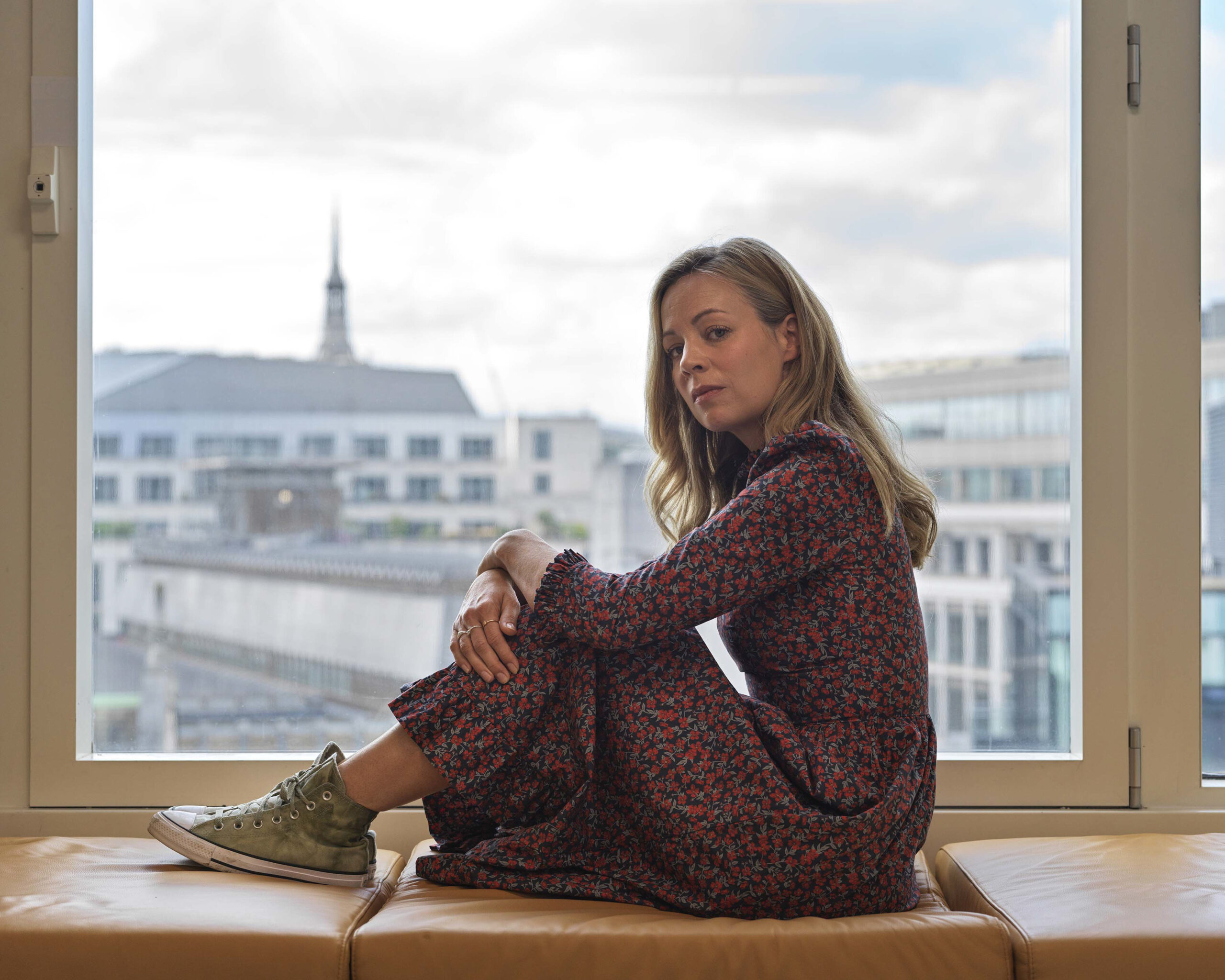 Rose from The Split season 3 posing in a window