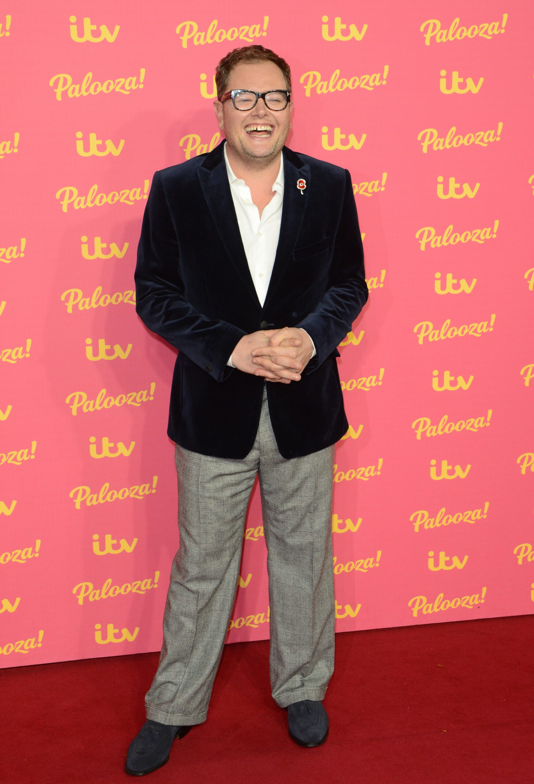 Alan Carr smiling at the ITV Palooza