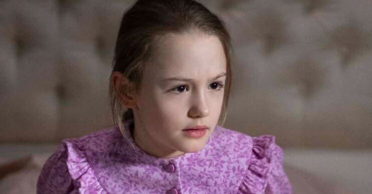 Amelie Bea Smith looking scared in Haunting of Bly Manor