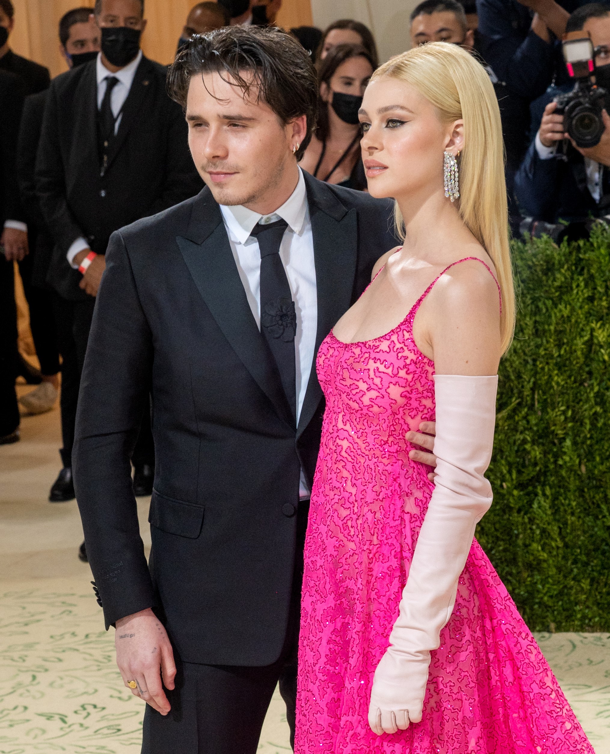 Brooklyn Beckham and Nicola Peltz pose at Met Gala