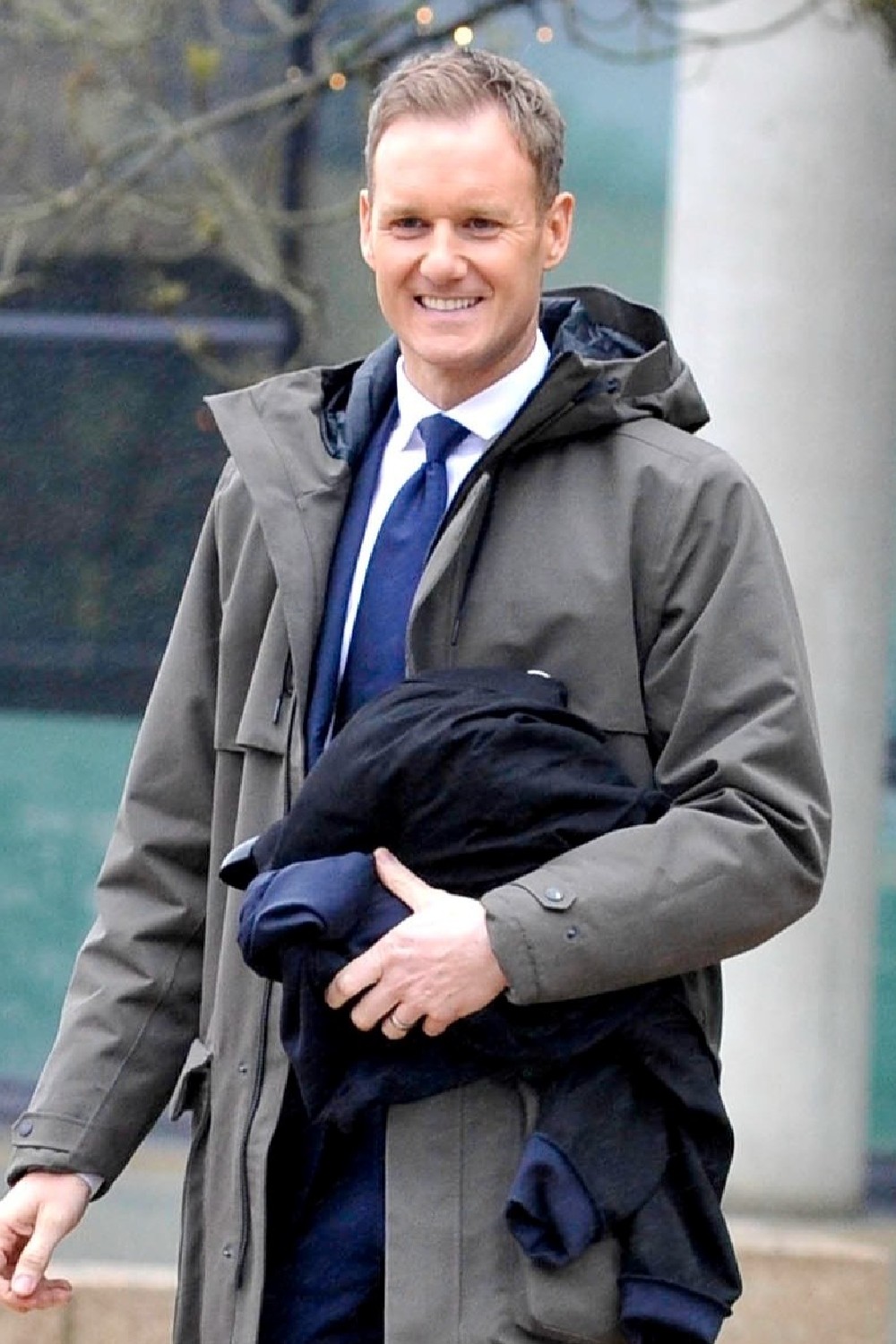BBC Breakfast presenter Dan Walker smiles outside BBC Breakfast studios