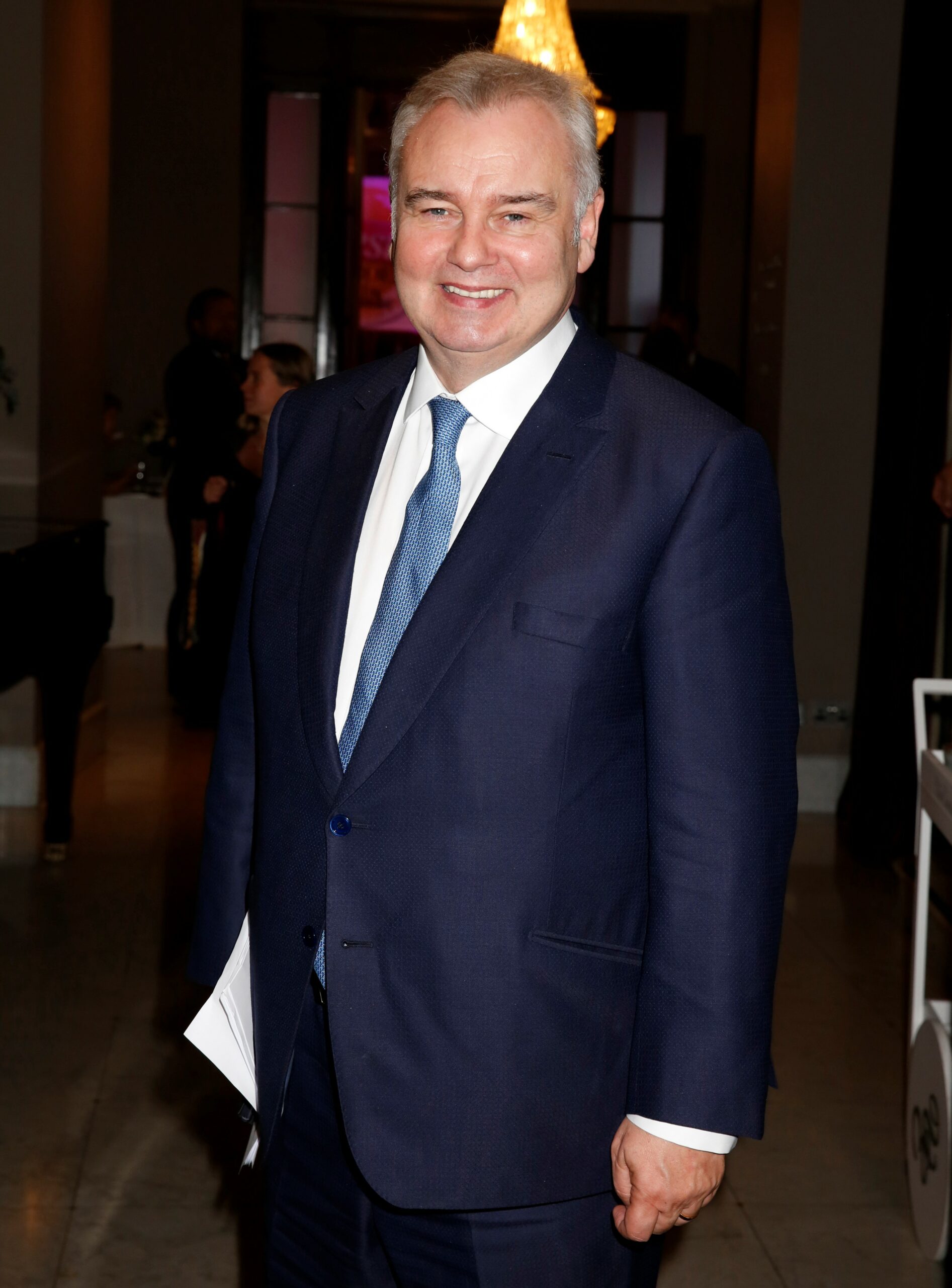 Eamonn Holmes smiling in suit At The Best Heroes Awards In London