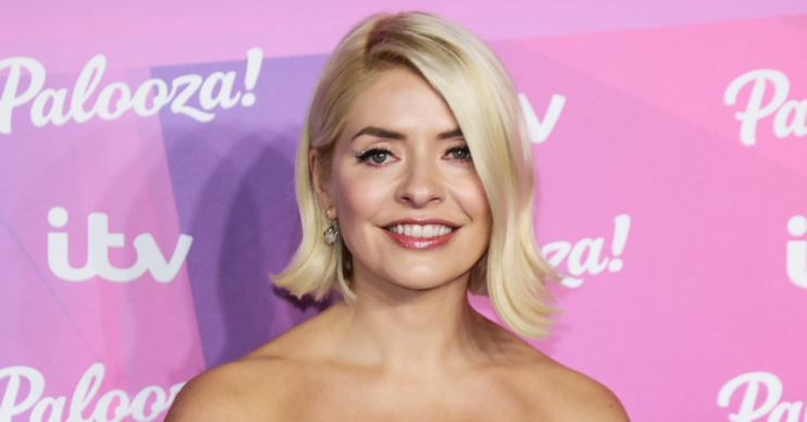Holly Willoughby on the red carpet smiling