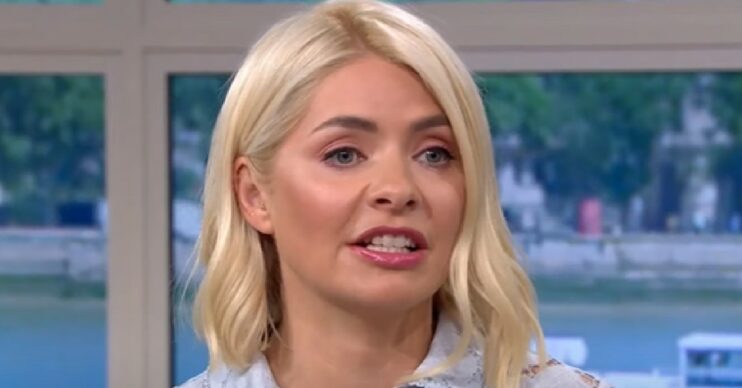 Holly Willoughby talking in blue lace dress on This Morning today April 19, 2022