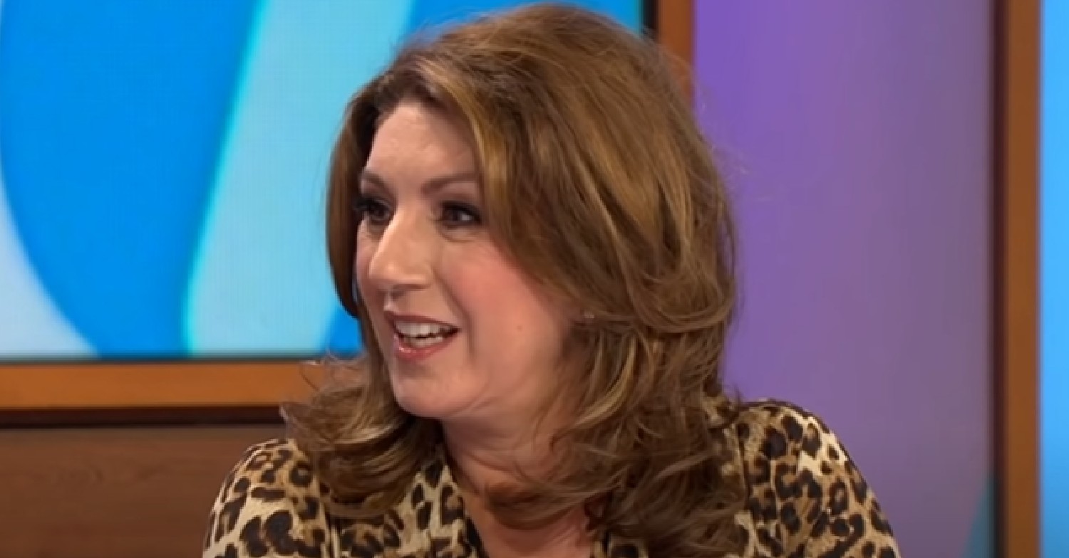 Jane McDonald smiling in animal print top on Loose Women