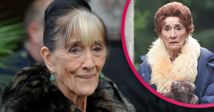 June Brown smiling and on set