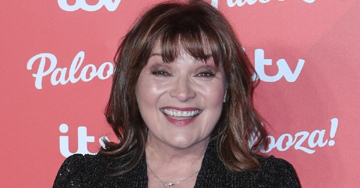 Lorraine Kelly smiles in black dress at ITV Palooza