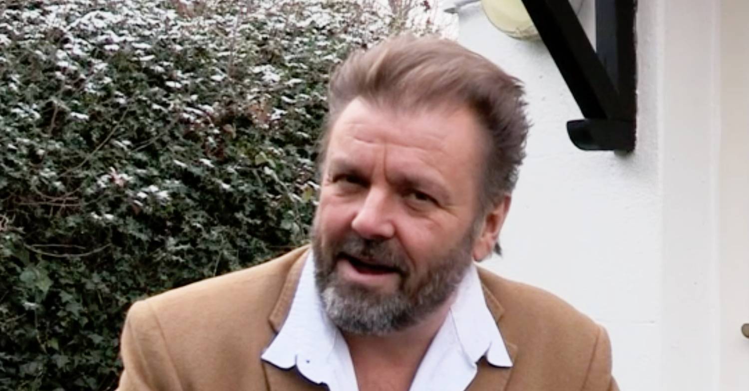 Homes Under the Hammer star Martin Roberts smiling at the camera