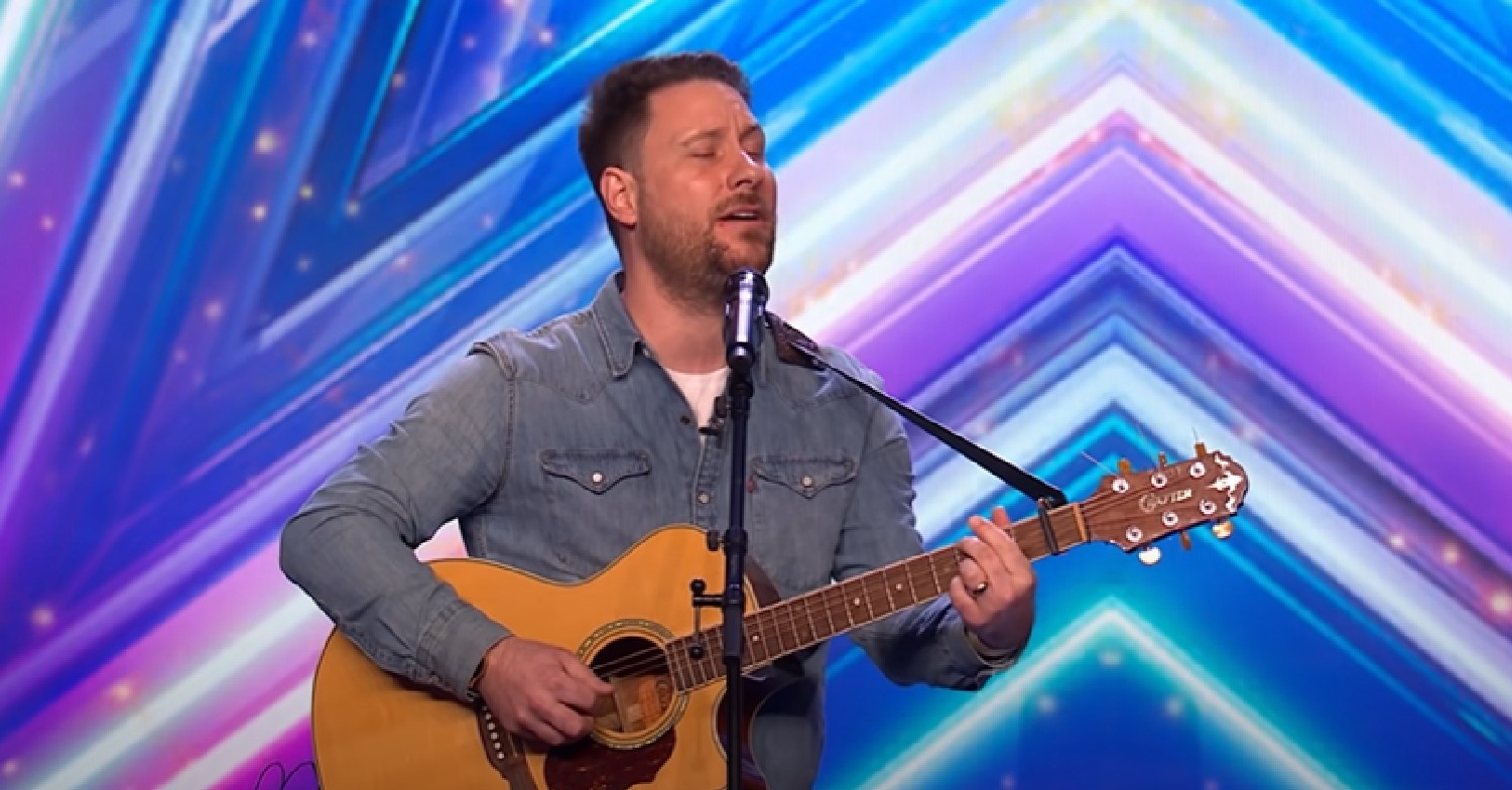 Nick Edwards singing with guitar on BGT