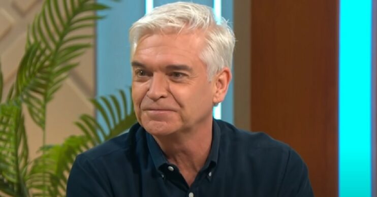 Phillip Schofield smiles in navy shirt on Lorraine