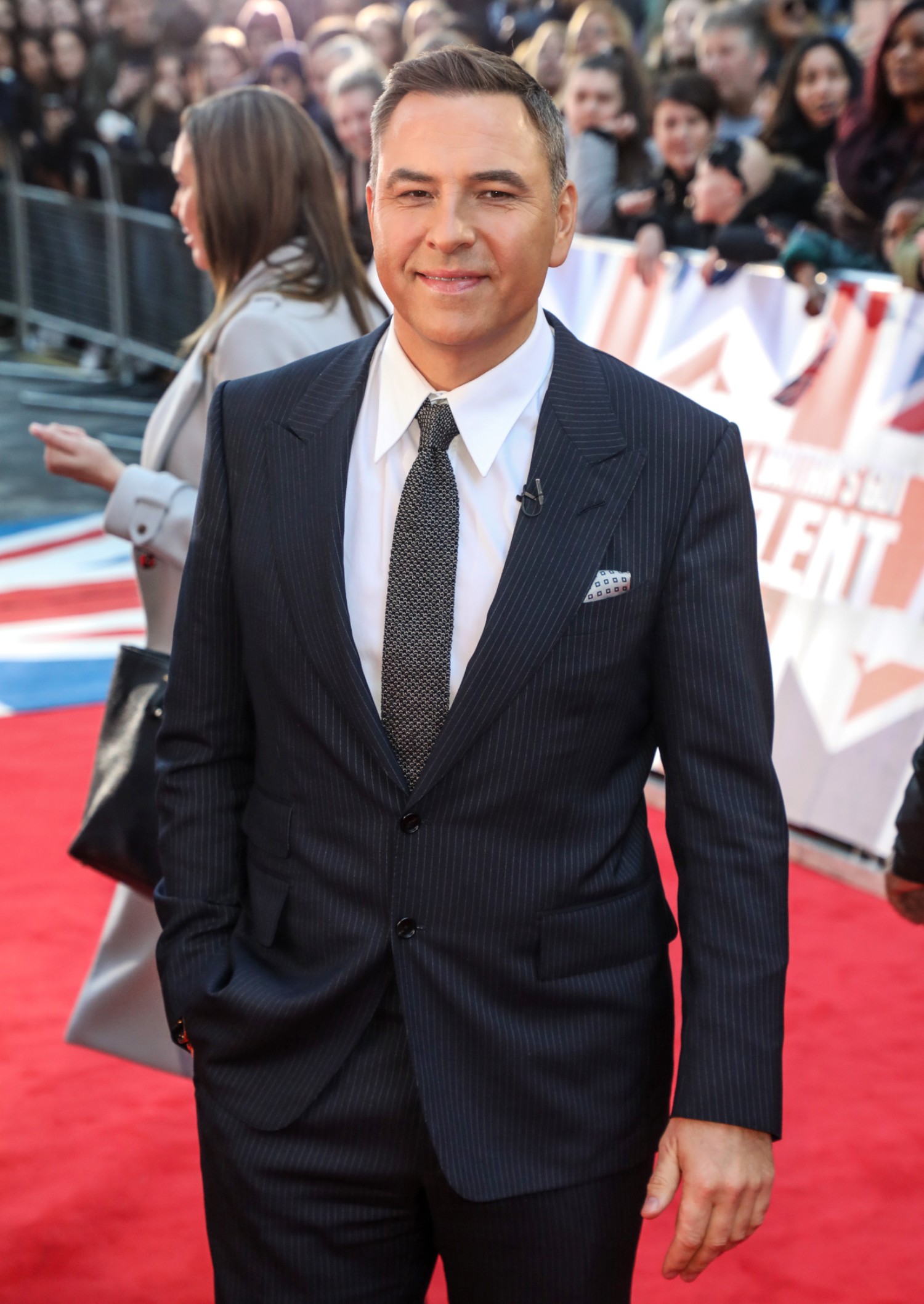David Walliams smiling on the red carpet