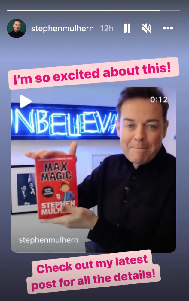 Stephen Mulhern holding his new kids' book