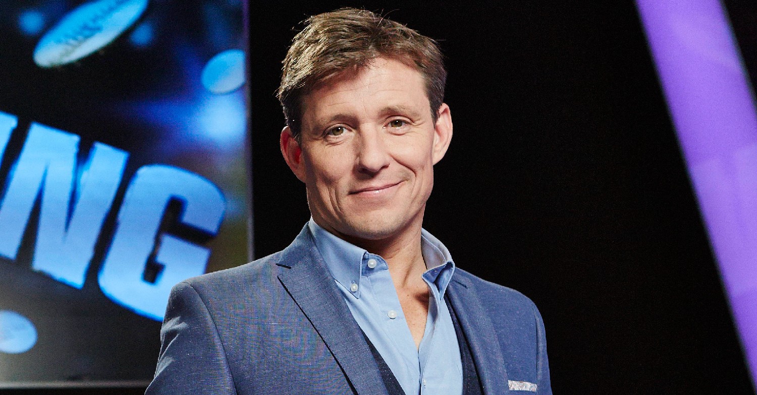 Ben Shephard poses in blue suit in Tipping Point promo shot