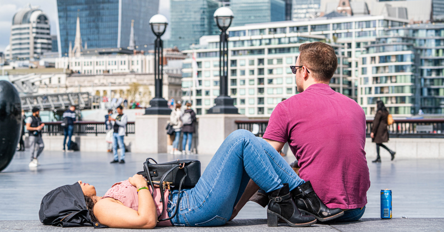 Two people relax in the sunshine