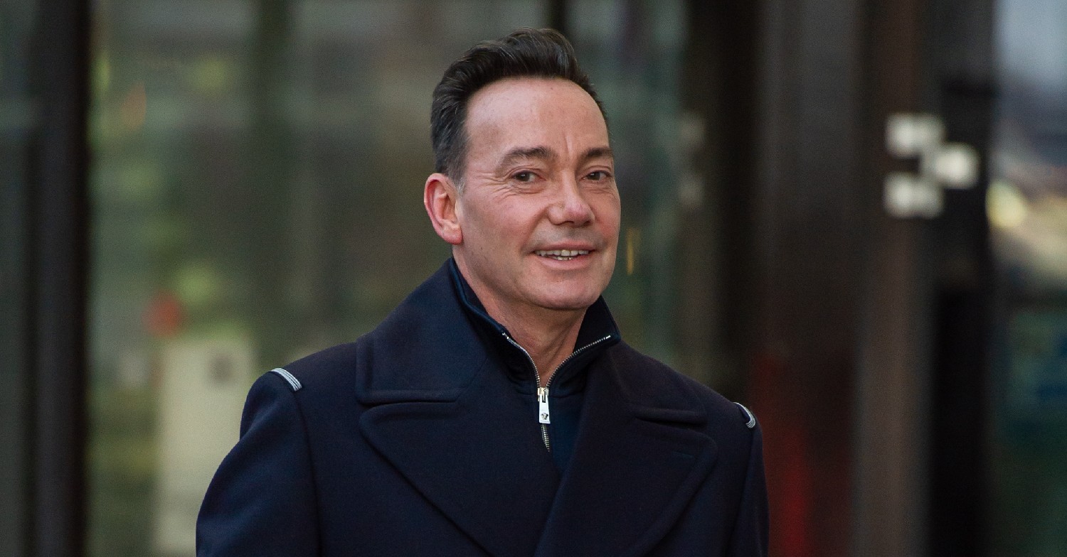 Strictly judge Craig Revel Horwood smiling at cameras