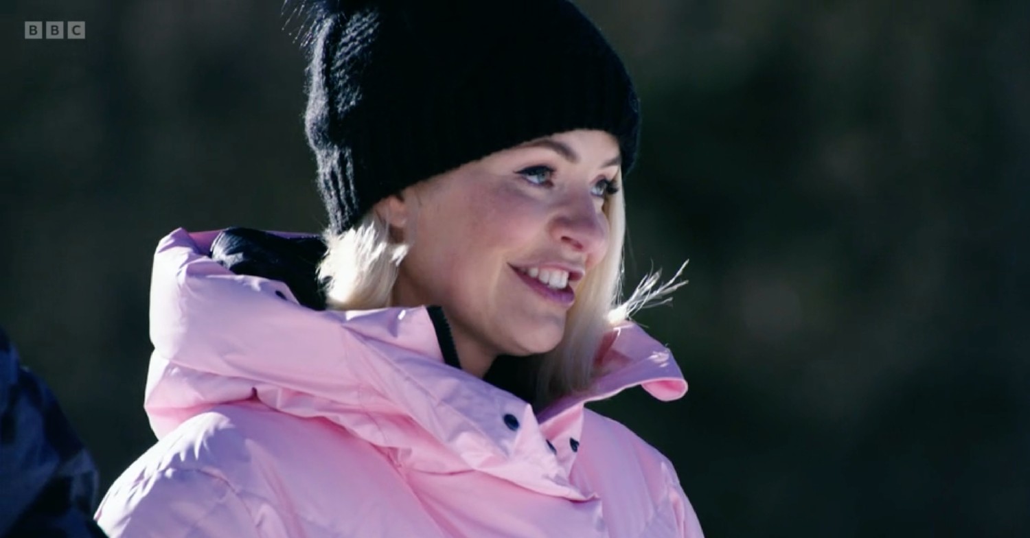 Holly Willoughby smiles in pink coat and hat on Freeze the Fear 