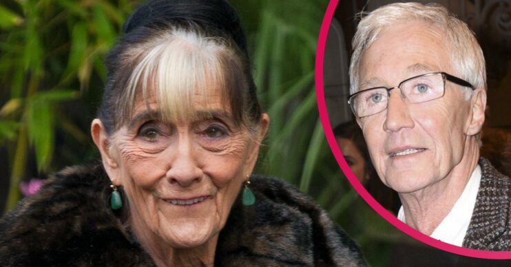 June Brown smiling in fur coat, Paul O'Grady during outing