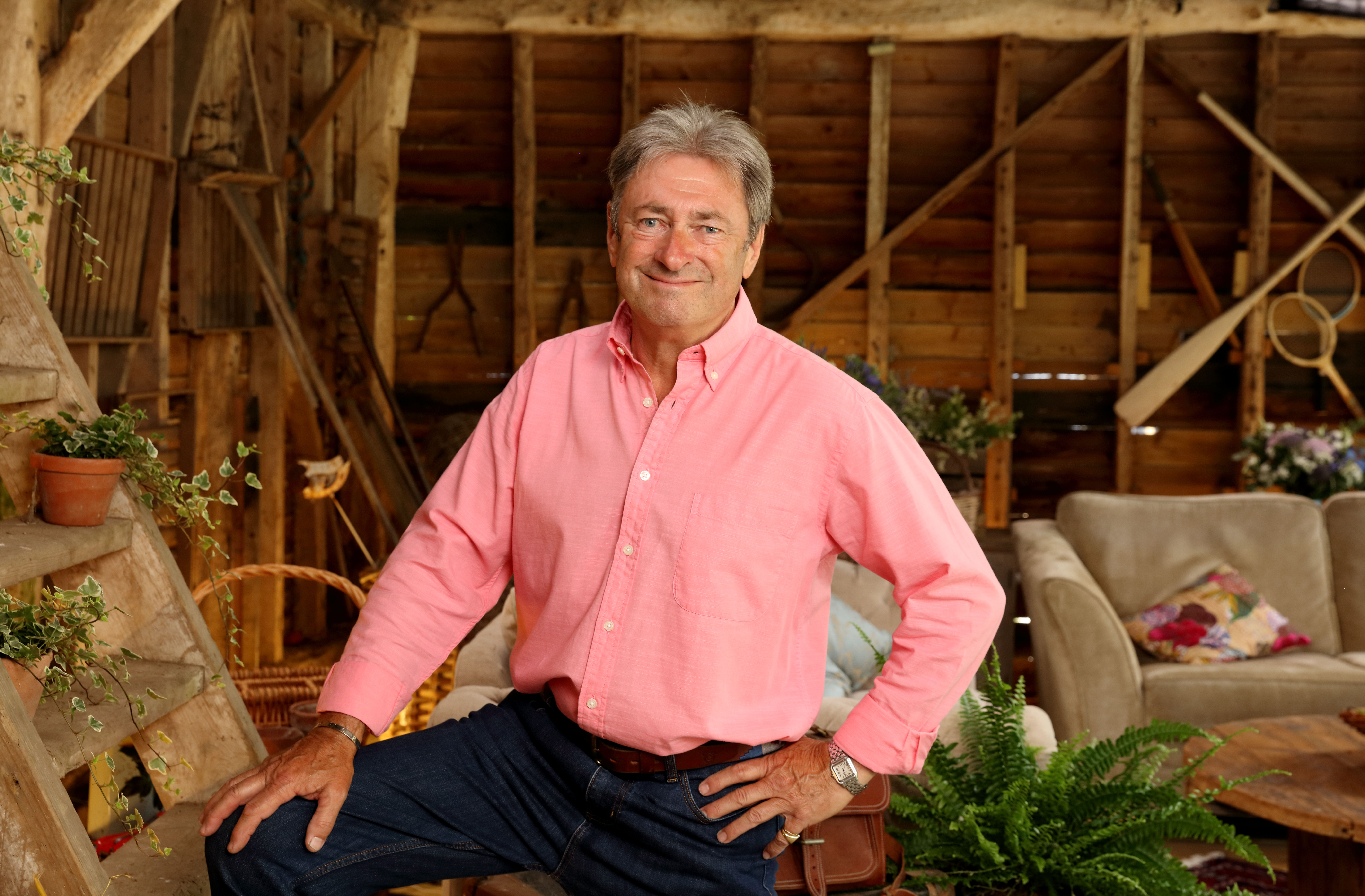 Alan Titchmarsh posing in his barn