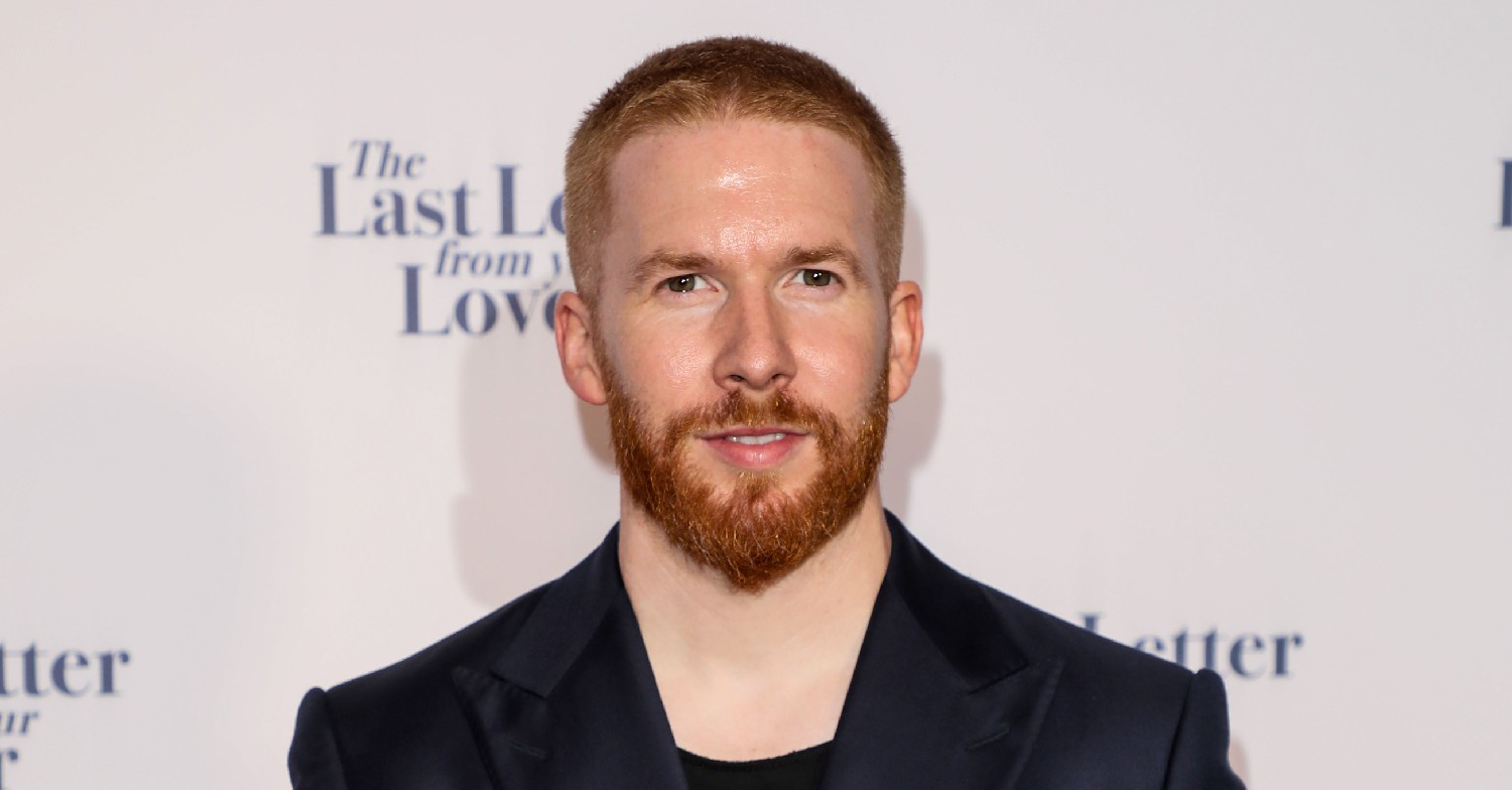 Strictly star Neil Jones with a shaved head on the red carpet