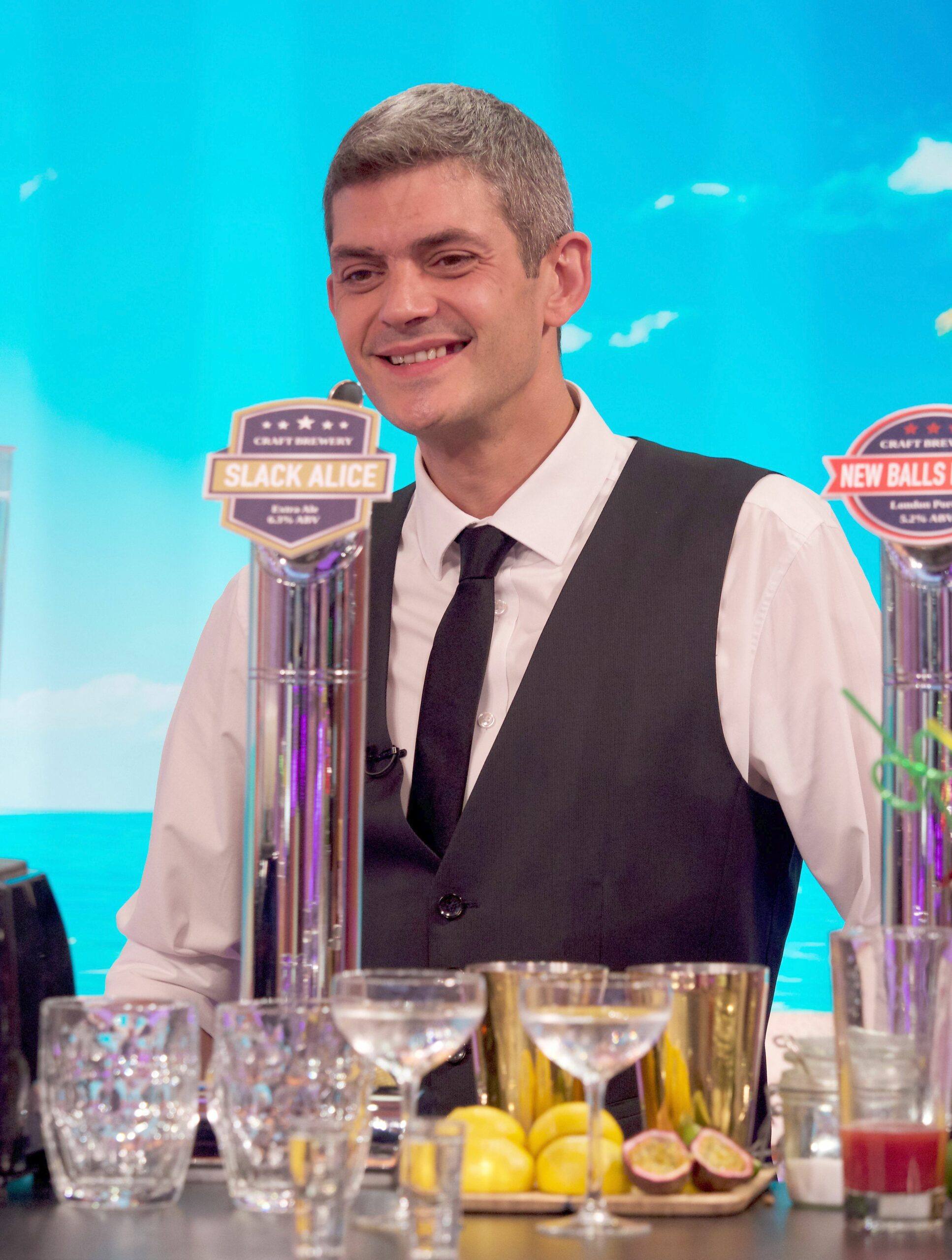 First Dates star Merlin Griffiths smiling on GMB