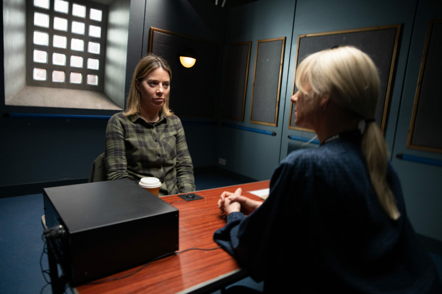 Abi Webster looks shellshocked as she's interviewed by police