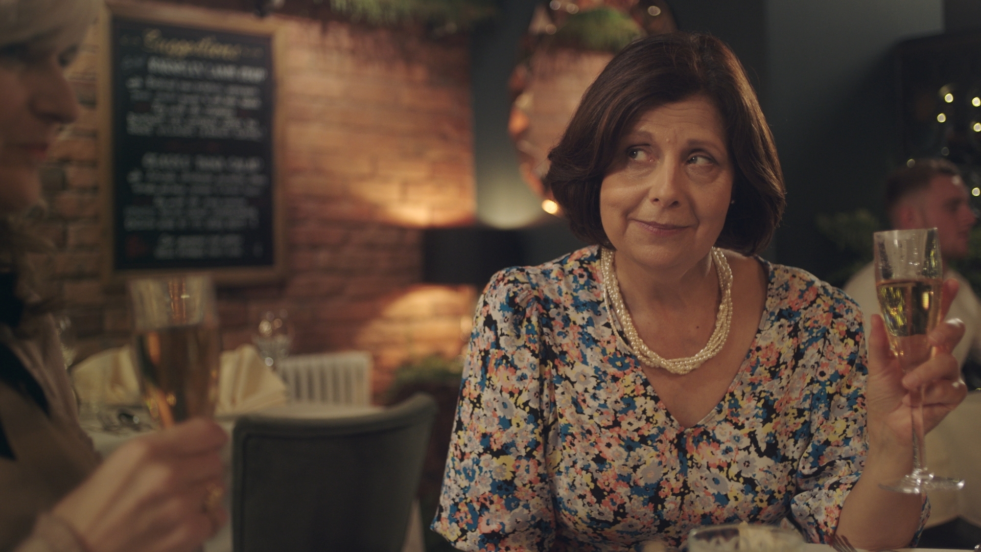 Tessa from The Other One having dinner