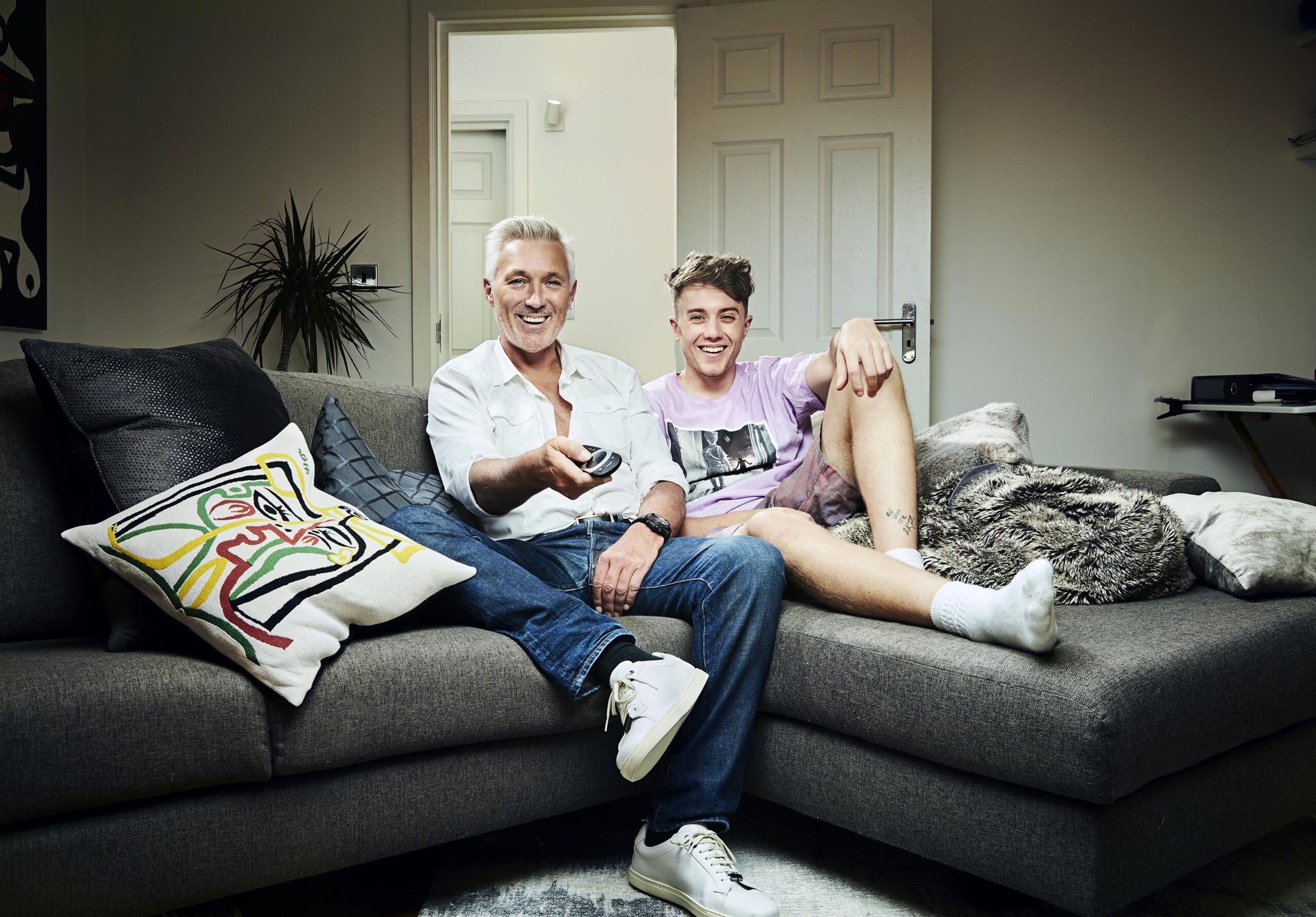 Martin and Roman Kemop on the sofa for Celebrity Gogglebox