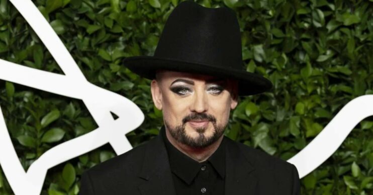 Boy George wearing a hat on the red carpet