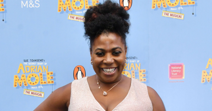 Brenda Edwards smiling on the red carpet