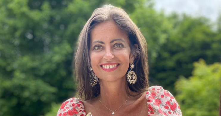 Dame Deborah James smiling in a floral dress