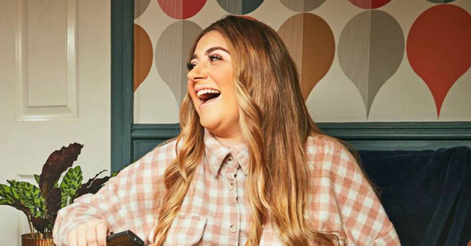 Gogglebox star Izzi Warner opens her mouth wide as she laughs