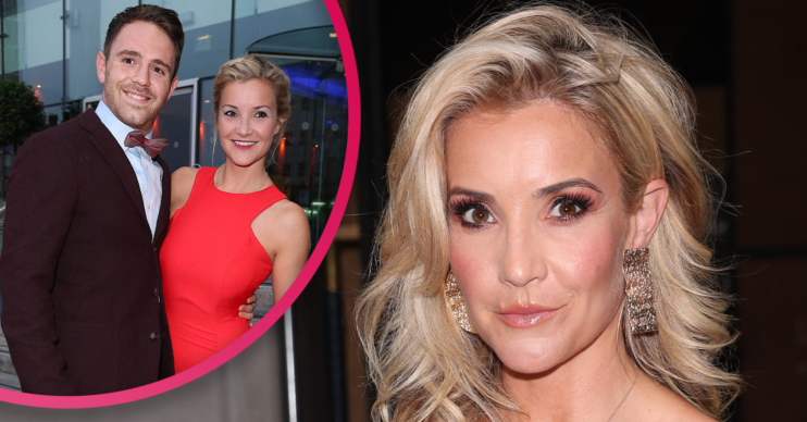Helen Skelton posing with her husband in a red dress