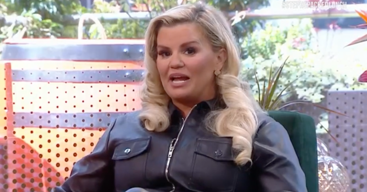 Kerry Katona wearing a black leather jacket