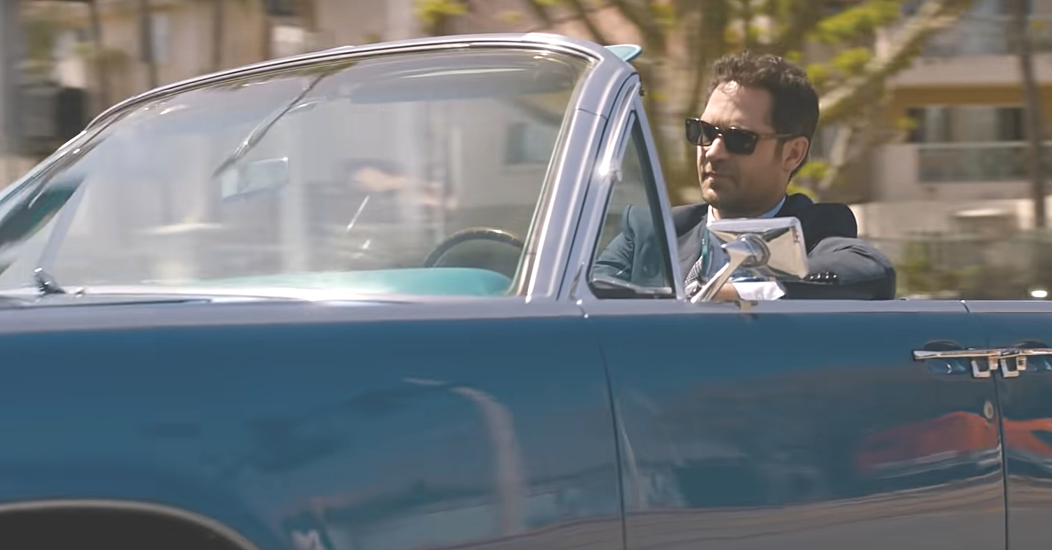 Manuel Garcia-Rulfo drives a Lincoln Town Car