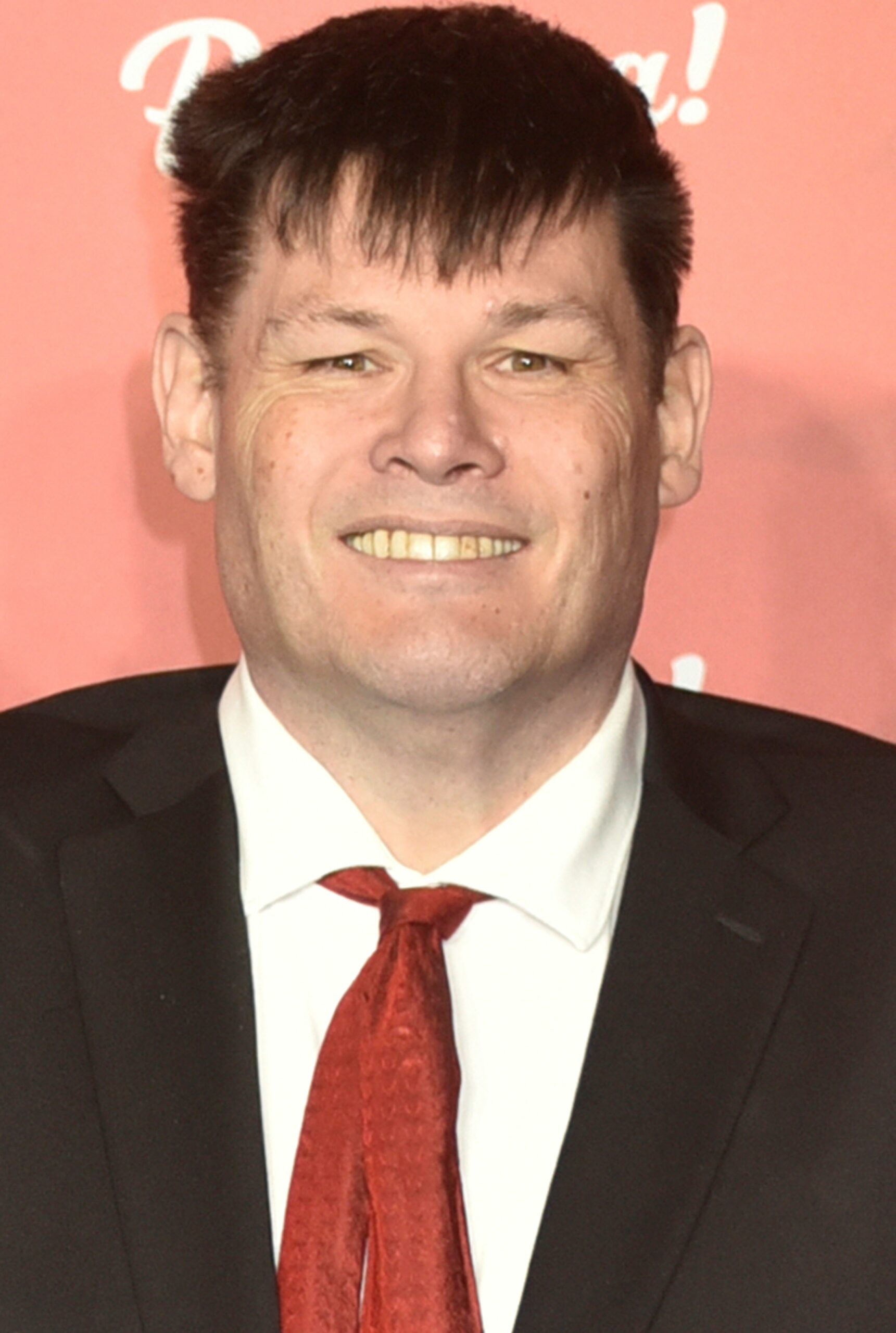 The Chase star Mark Labbett in suit at ITV Palooza