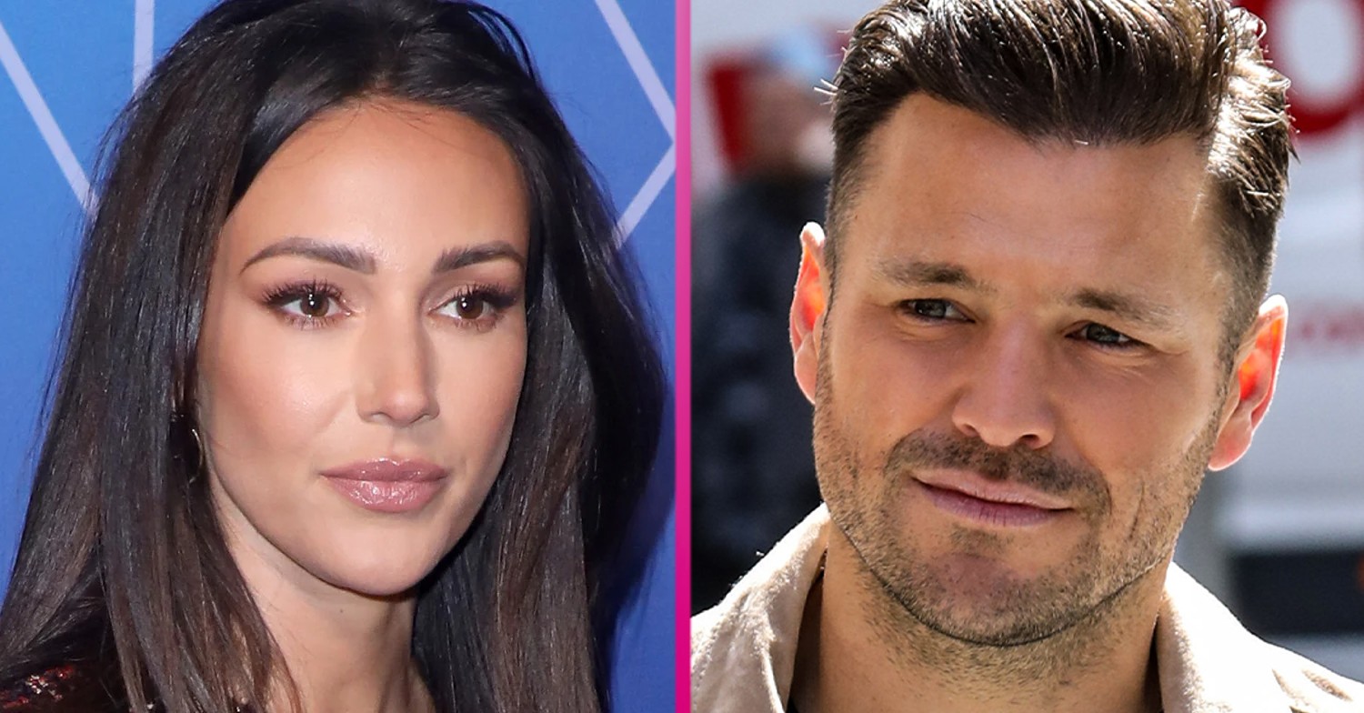 Michelle Keegan and Mark Wright smiling at the camera