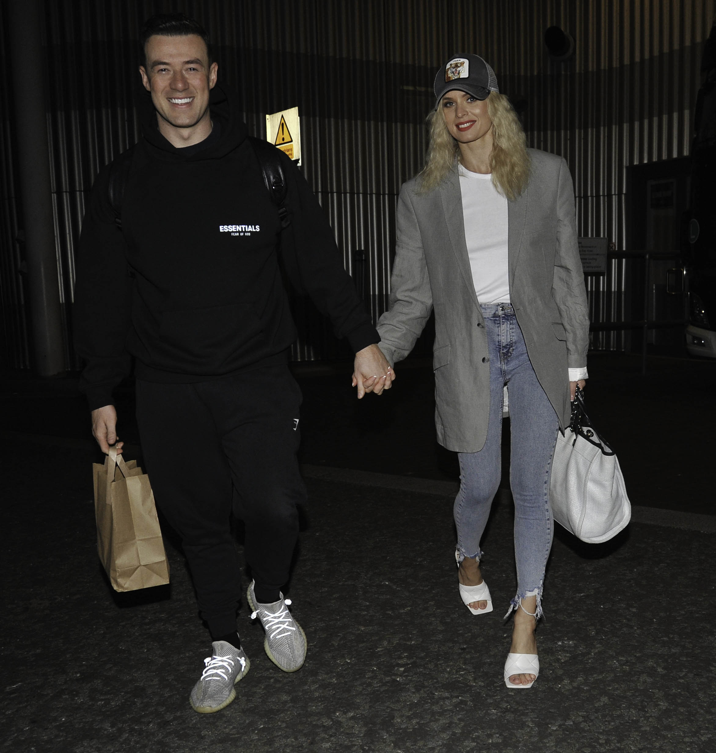 Strictly's Kai and Nadyia hold hands and smile