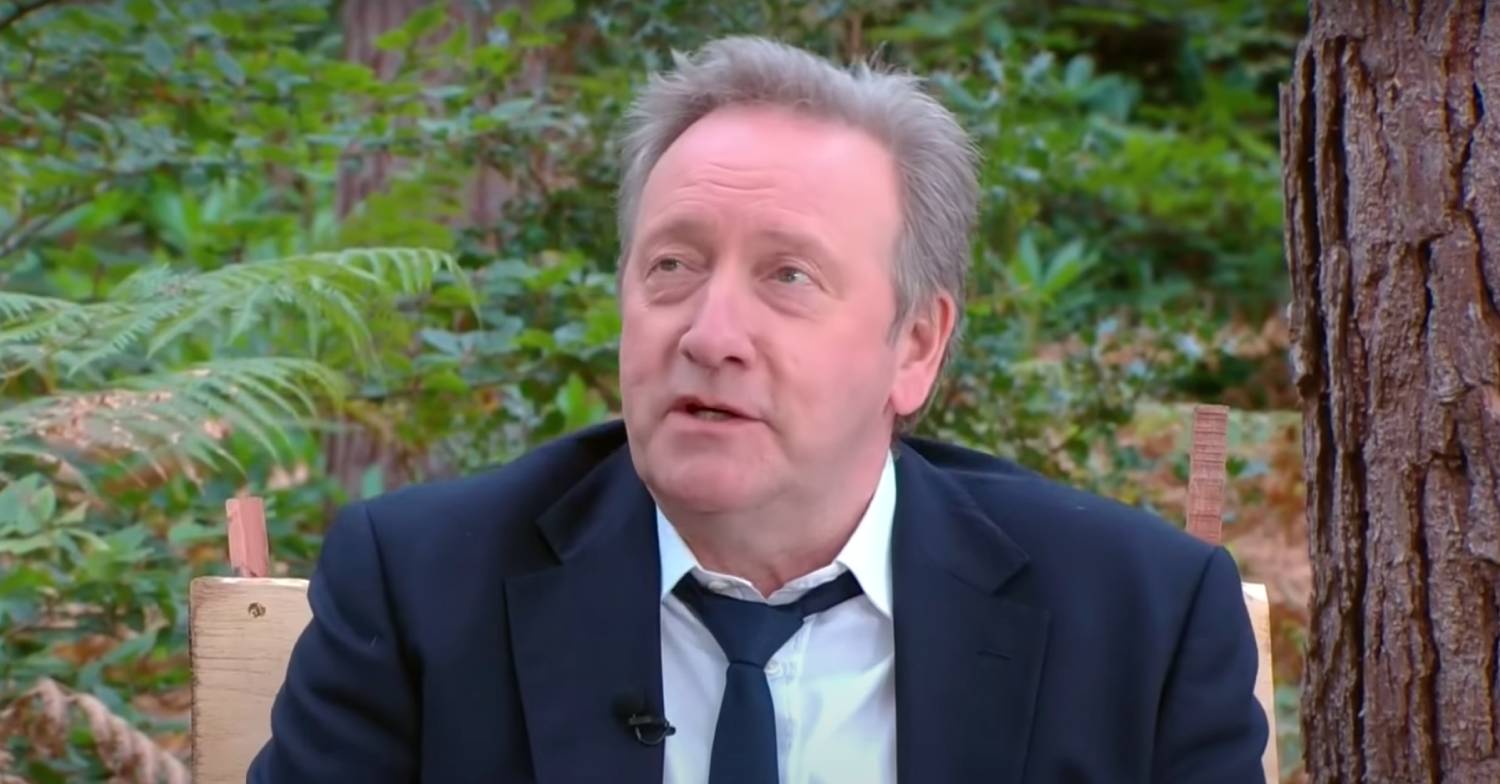 Neil Dudgeon, star of the Midsomer Murders cast, looks slightly upwards