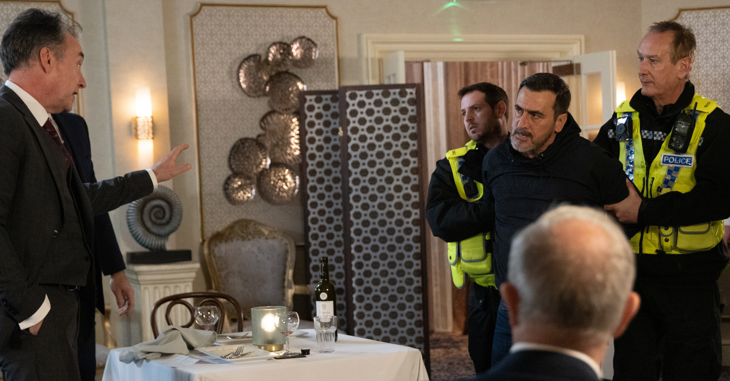 Coronation Street character Peter is arrested by two police men