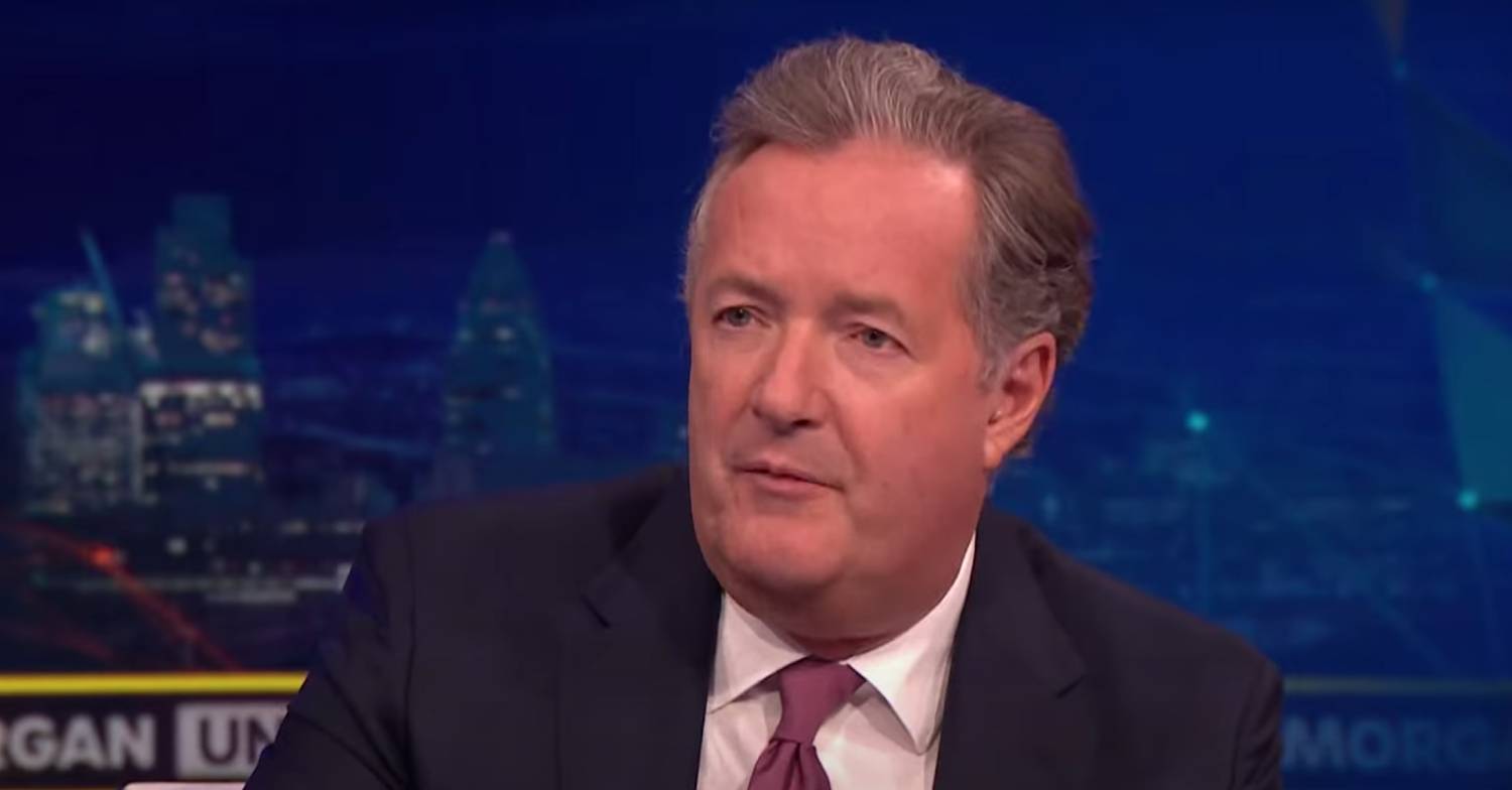 Piers Morgan listens intently