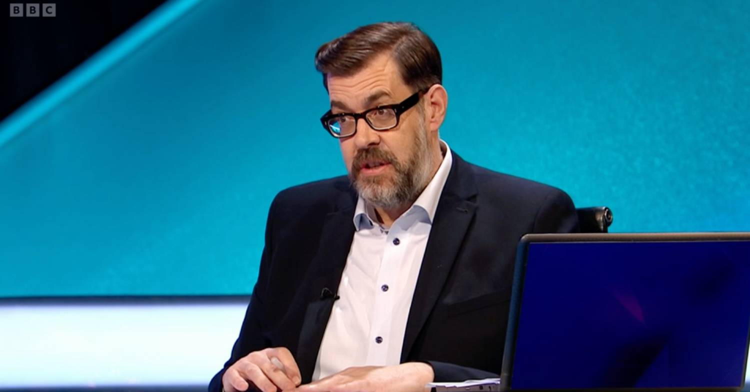 Richard Osman in suit on Pointless