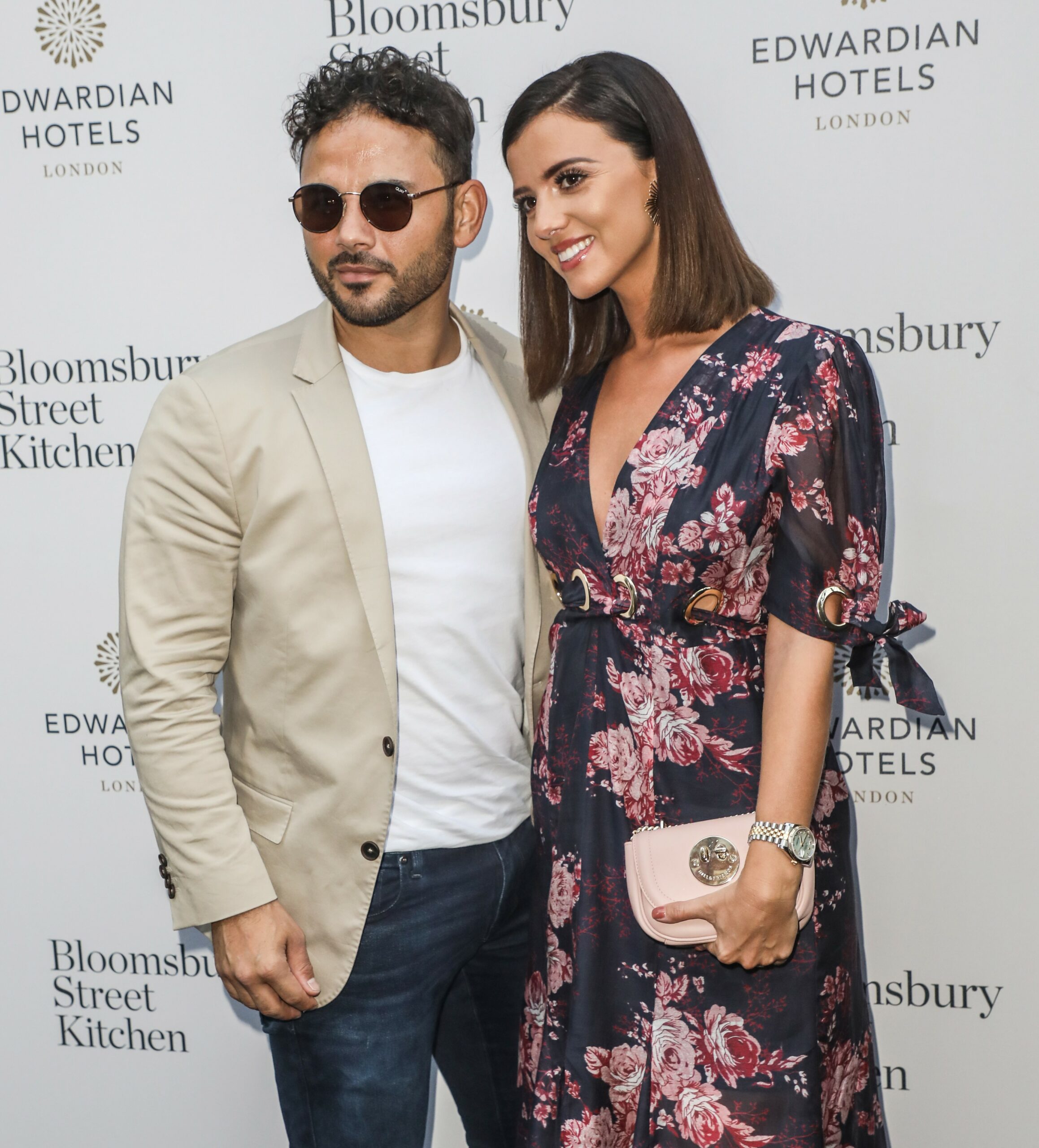 Ryan Thomas and Lucy Mecklenburgh pose for cameras at event 